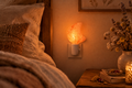 Orange Himalayan salt moon night light glowing warmly in a cozy bedroom